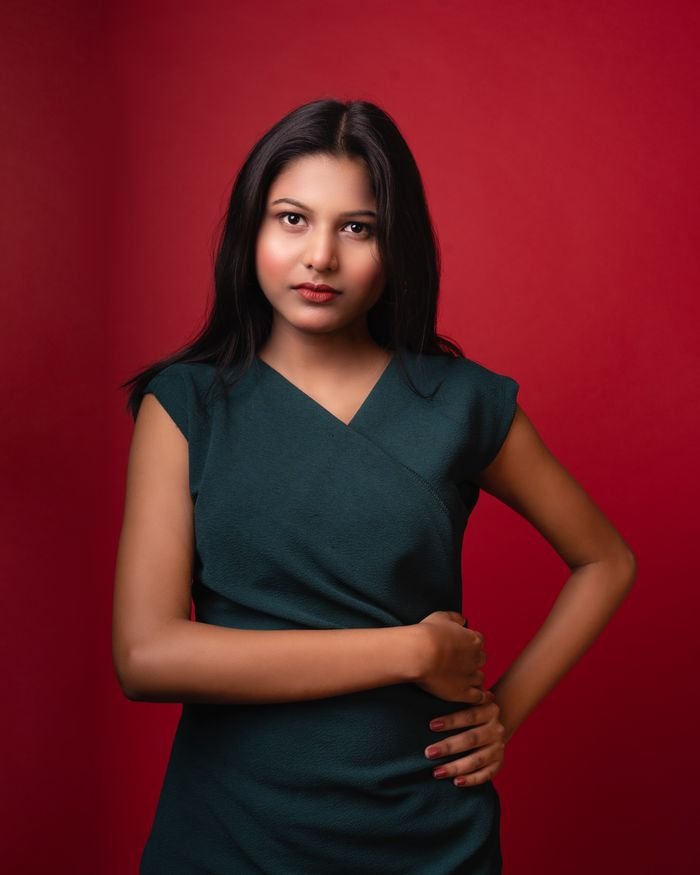 Crafting Captivating Headlines: Your awesome post title goes here Stylish studio portrait of a young woman in Varanasi, showcasing elegance and confidence.